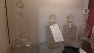 A pair of hobnail cut glass decanters and two others