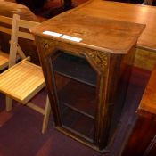 A Victorian inlaid walnut music cabinet fitted single glazed panel door enclosing shelves