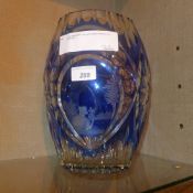 A cut blue glass vase with pictoral reserve of a fisherman