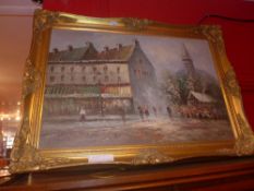 An oil on canvas Parisian street signed in lower right in gilt frame