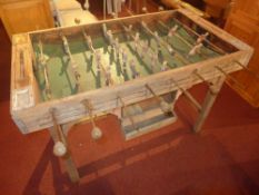 An early C20th table football game with playing balls