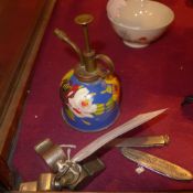 A penknife decorated with the ship 'Frins Bernhard' together with another three whistles, and a hand
