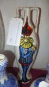 An Italian 1950s tall vase decorated with musicians