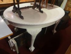 A white painted Queen Anne style mahogany dining table on cabriole suppports with two extra leaves