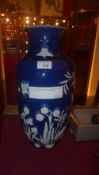 A Chinese blue glazed vase of large size decorated with flowers birds and insects in relief
