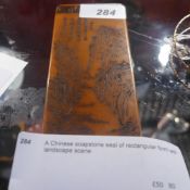 A Chinese soapstone seal of rectangular form with landscape scene