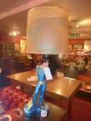 A 1950's American table lamp in the form of a dancer and with shade