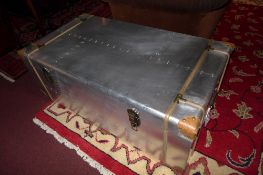 An aluminium aviator style trunk with twin handles