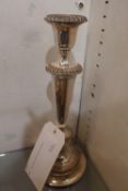A pair of C19th silver plated candlesticks