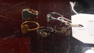 A collection of five dress rings