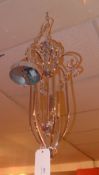 A chromed hanging light