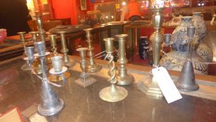 A collection of C19th brass candlesticks