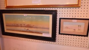An early C20th Gouache Arabian Landscape of figures on camels by a river, signed H.Brett 1906, in
