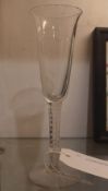 An C18th Opaque twist wine glass an Yves Saint Laurent brown leather shoulder bag