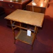 A Victorian Aesthetic movement bamboo occasional table of rectangular form with an undertier