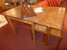 A C20th walnut draw leaf dining table