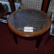 A C19th walnut low table with circular inset grey marble top and raised on square tapering supports