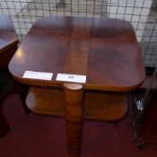 An Art Deco walnut occasional table of square shape and two tiers