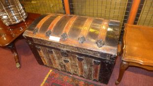 A vintage wooden and metal bound dome to