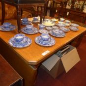 A Victorian oak extending dining table w