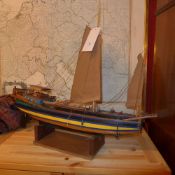 A scale model sailing boat on stand