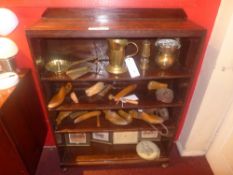 An oak open bookcase with adjustable she