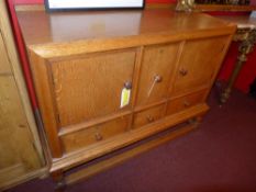 A Heals honey oak sideboard fitted arran