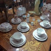 A silver plated cruet set together with