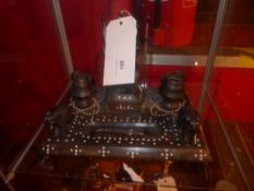 An ebony and ivory inlaid desk stand dec