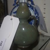 A Chinese crackle celadon glazed twin ha