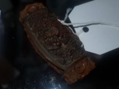 A C19th ornately carved conquilla nut sn
