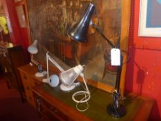 A black painted angle poise lamp ogether with three other lamps (4)