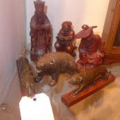 Two Chinese carved hardwood figurines to