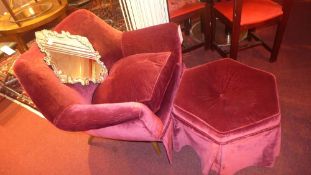 A 1960's armchair with an hexagonal stoo