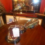 A pair of table top magnifying glasses o