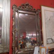 A Rococo style mirror