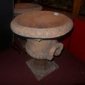 A pair of terracotta Campana style urns