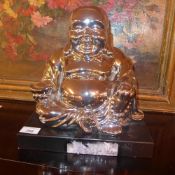 A silvered seated Buddha