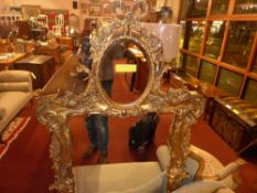 A French gilt wall mirror with bevelled
