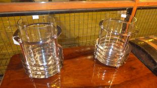 A chrome and glass cylindrical storm lan
