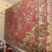 A Persian Hamadan rug with an ivory meda