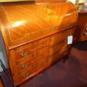 A French inlaid circular fronted bureau