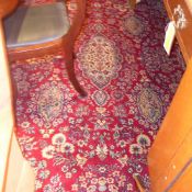 A Persian design carpet with floral desi
