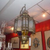 A Moroccan design gilt metal hanging lan