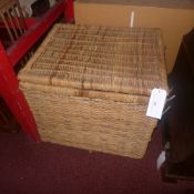 A large wicker laundry basket