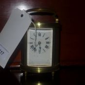 A late C19th oval French carriage clock