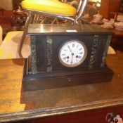 A Victorian slate mantel clock with Arab
