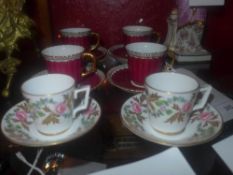 A part set of Royal Crown Derby cups and