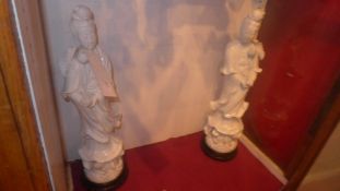 A pair of Blanc de Chine standing figure
