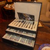 A cased canteen of Versaille gold and si